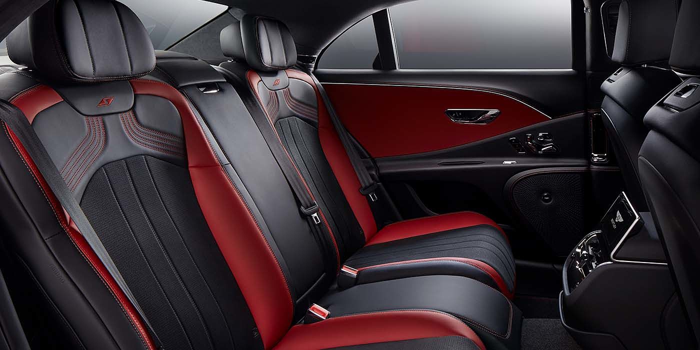 Bentley Maastricht Bentley Flying Spur S sedan rear interior in Beluga black and Hotspur red hide with S stitching