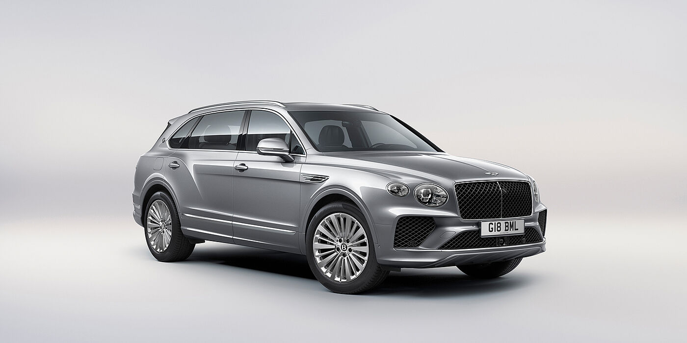 Bentley Maastricht Bentley Bentayga Extended Wheelbase luxury SUV front three quarter view in Moonbeam paint with 21 inch five spoke painted wheels