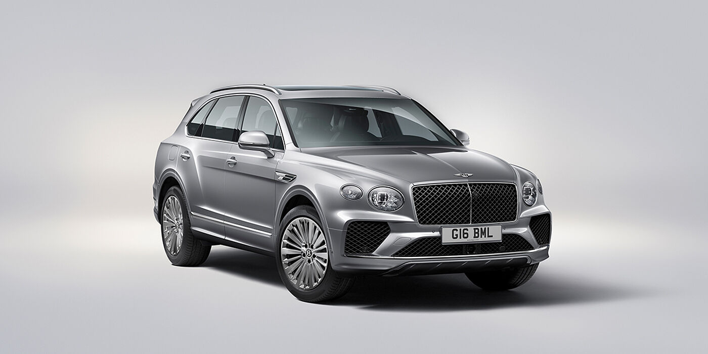 Bentley Maastricht Bentley Bentayga luxury SUV front three quarter view in Moonbeam paint with matrix grille and 21″ 5 spoke painted wheels