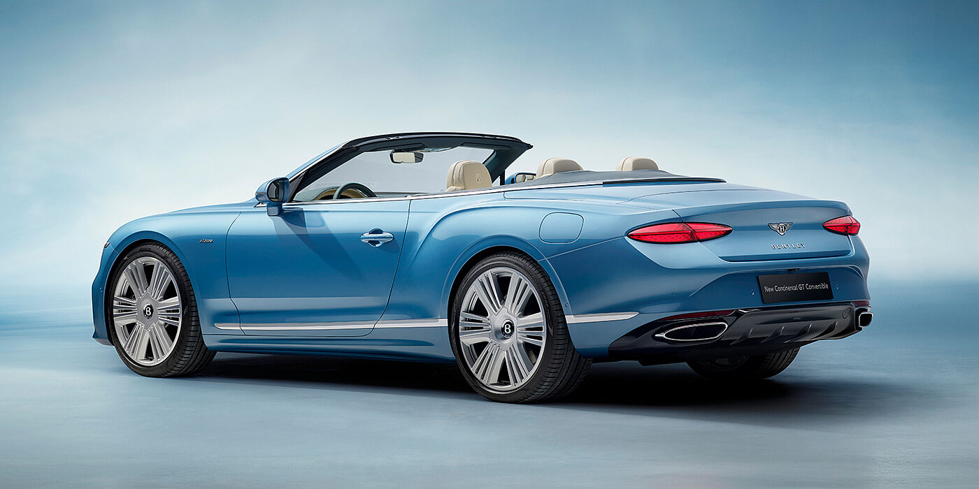 Bentley Maastricht New Bentley Continental GTC Azure convertible rear view in Light Windsor blue paint with 22 inch ten spoke wheels and chrome exterior details