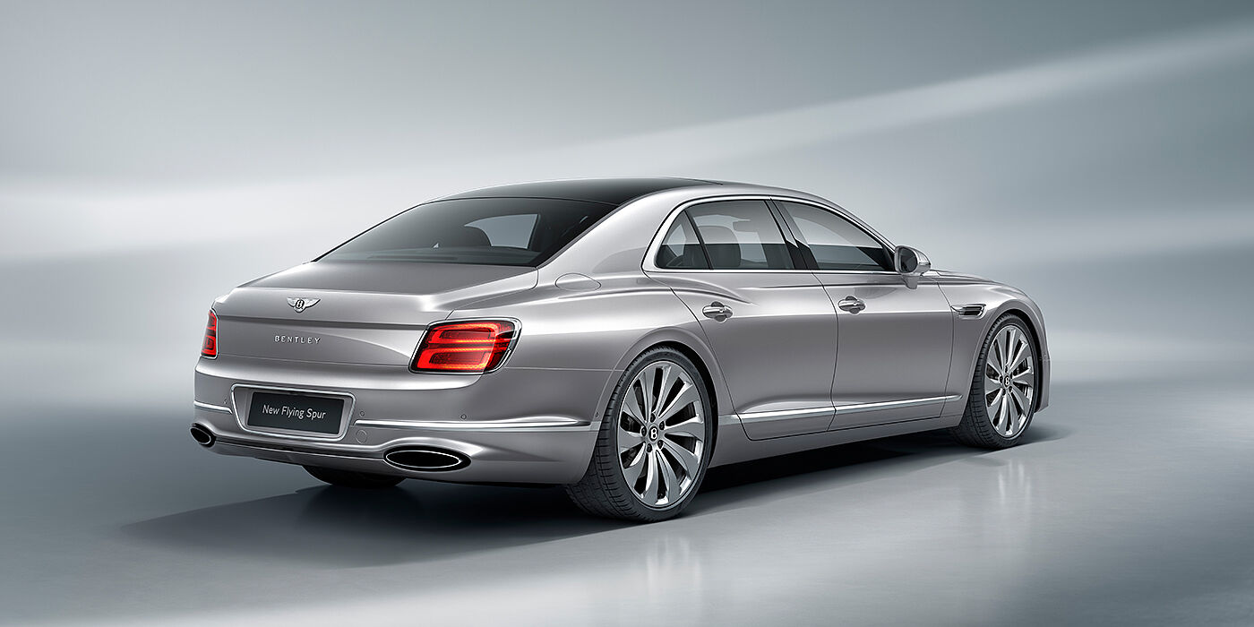 Bentley Maastricht New Bentley Flying Spur sedan rear view in Silverlake paint with ten spoke wheels and chrome matrix grille