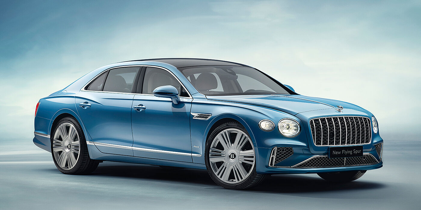Bentley Maastricht New Bentley Flying Spur Azure sedan front view in Light windsor blue by Mulliner paint with 22 inch Azure wheels and chrome exterior details
