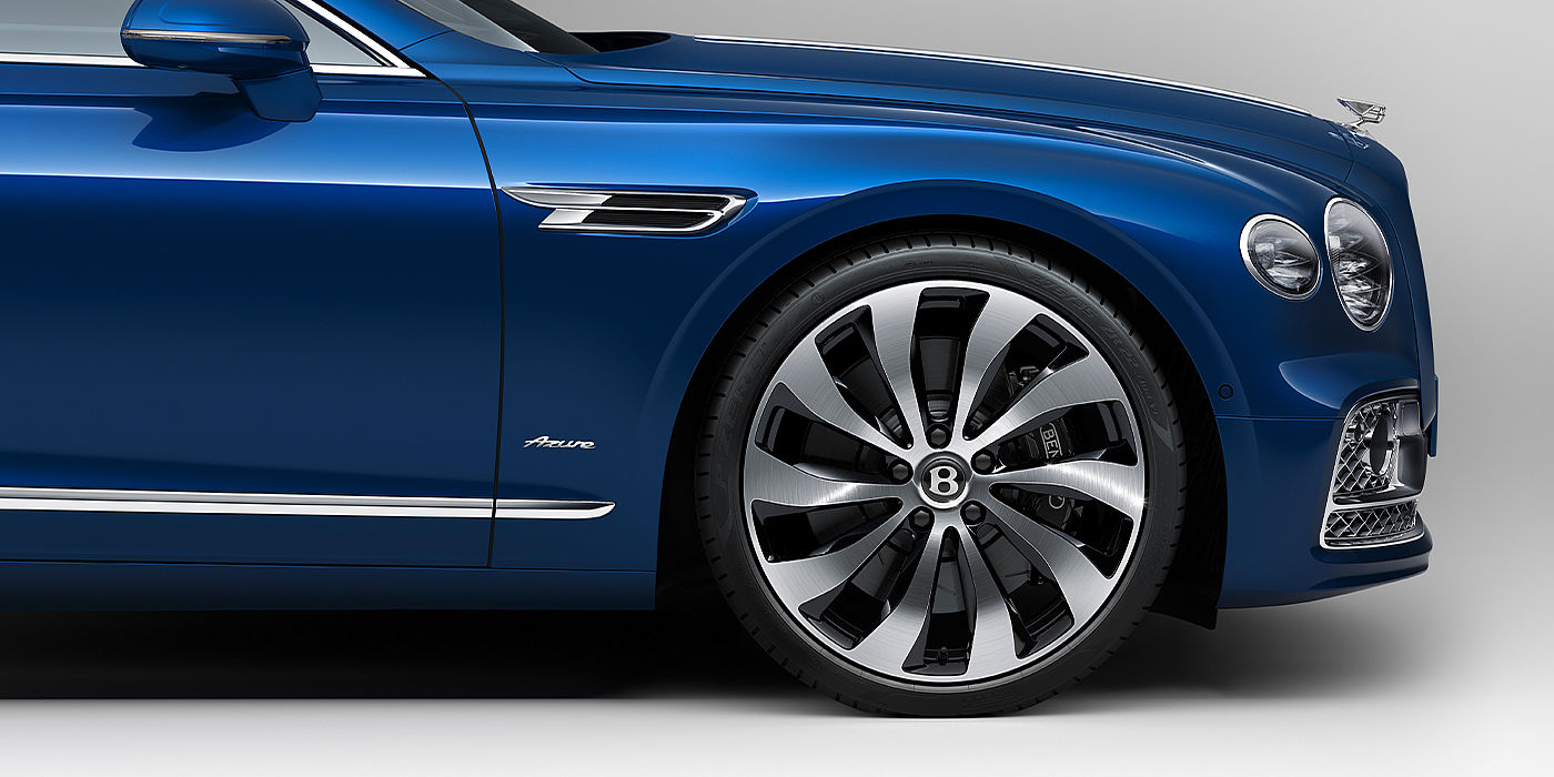 Bentley Maastricht Bentley Flying Spur Azure sedan side close up in Sequin Blue paint with Azure badge
