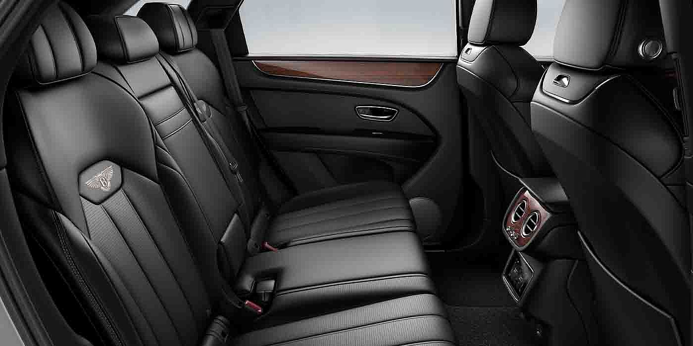 Bentley Maastricht Bentley Bentayga EWB interior view for rear passengers with Beluga black hide.