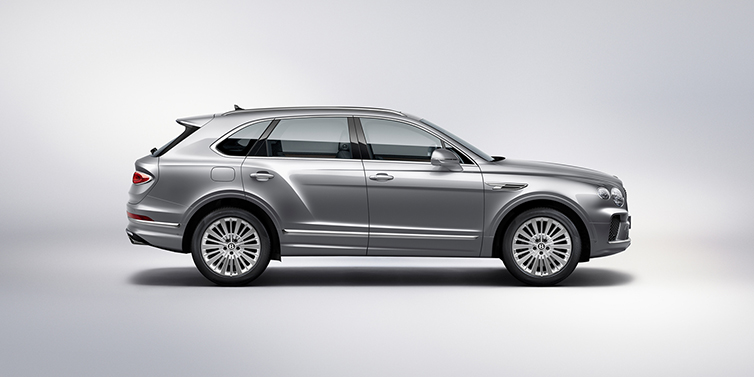 Bentley Maastricht Bentley Bentayga SUV side profile in Moonbeam silver paint against white background featuring 21 inch 5 spoke wheels