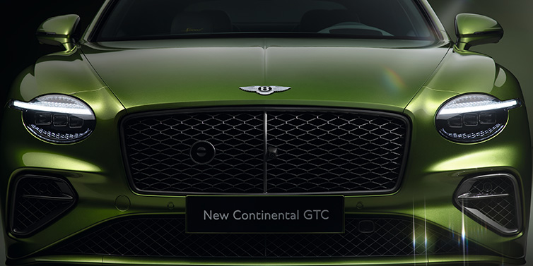 Bentley Maastricht Bentley Continental GTC Speed convertible front bonnet detail in Tourmaline Green paint showing new light design