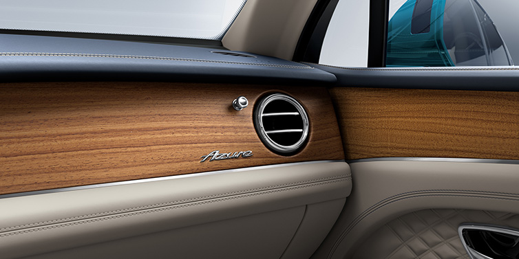 Bentley Maastricht Bentley Bentayga Extended Wheelbase Azure front dash showing Open Pore Koa veneer surrounded by Portland and Imperial Blue hides