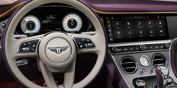 Bentley Maastricht Bentley Continental GTC Mulliner convertible steering wheel and drivers screens surrounded by Damson purple and Linen hides